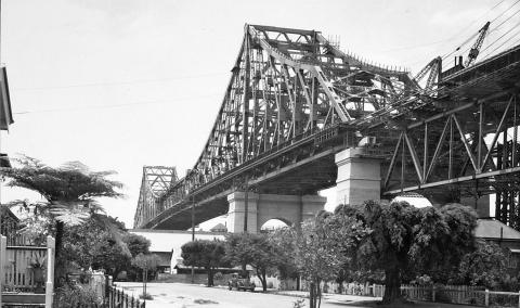 Looking up at the Story Bridge from Main Street