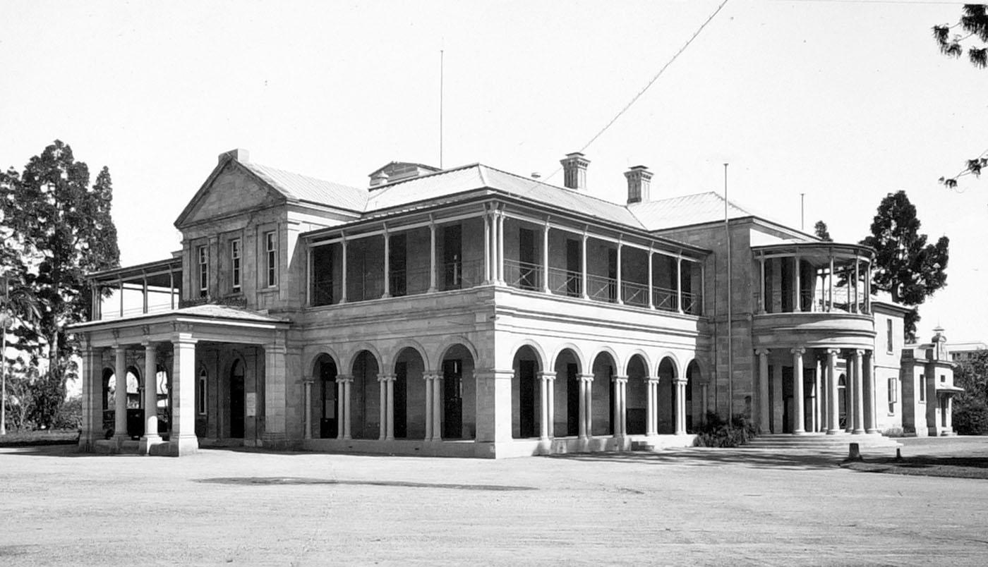 Old Government House seen from across the road and showing the large front garden