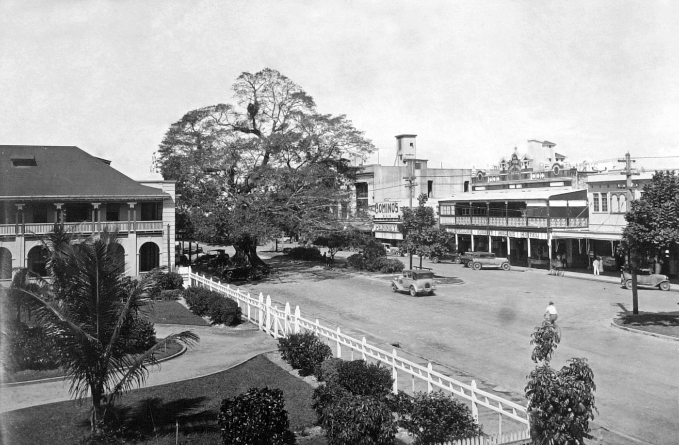 View of Abbott Street, Cairns featuring Cominos Cafe