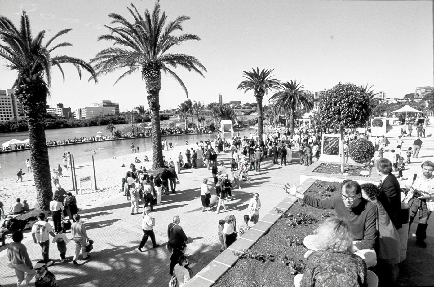 Loads of people visiting Southbank beach, in inner-city Brisbane